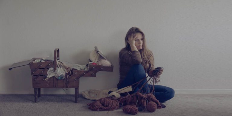 Forensic Accountancy - Stressed woman knitting